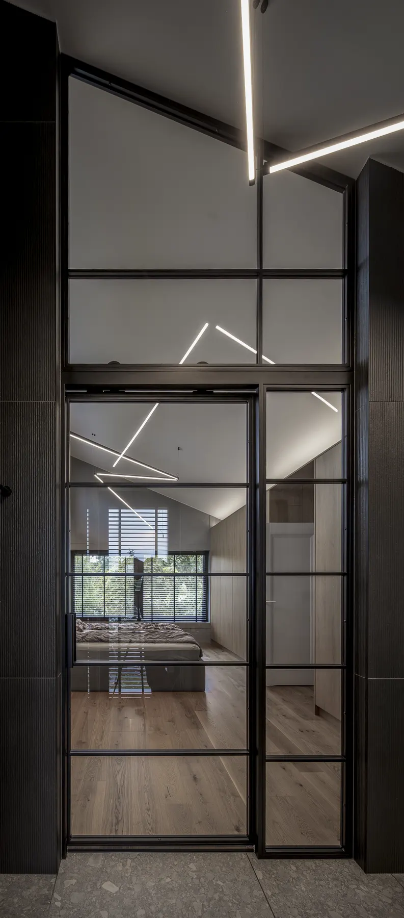 The steel door seen from the bathroom side