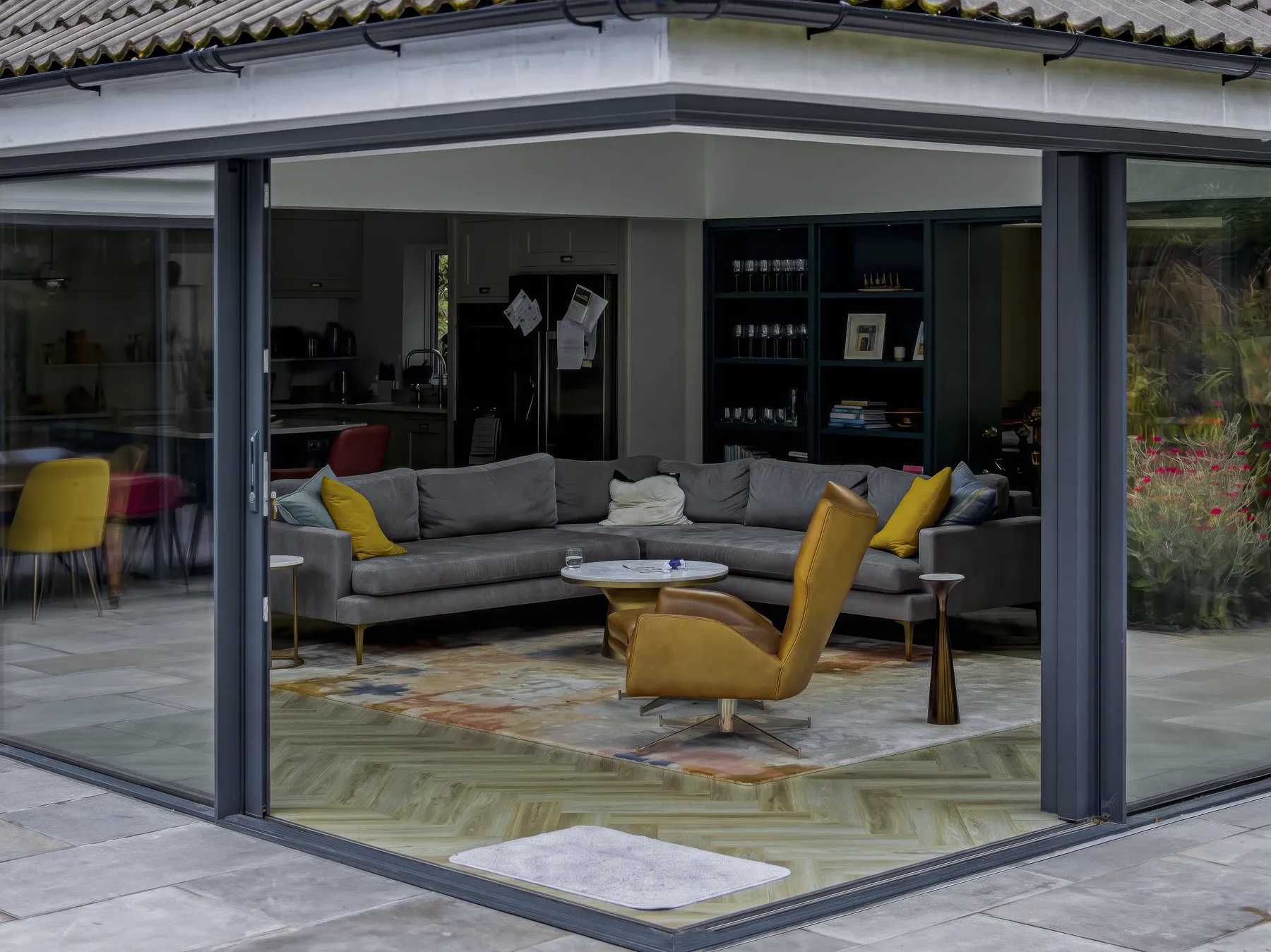 Open corner sliding doors seen from the garden